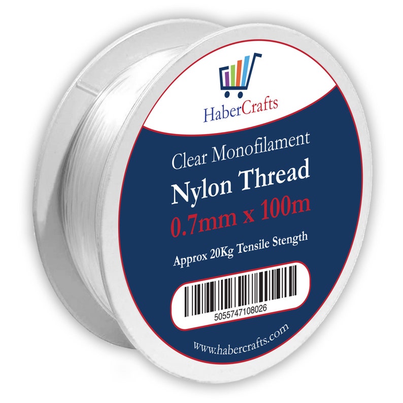 May include: A spool of clear monofilament nylon thread, 0.7mm thick and 100 meters long. The spool is labeled "Clear Monofilament Nylon Thread 0.7mm x 100m" and "Approx 20Kg Tensile Strength". The label also includes a barcode and the website "www.habercrafts.com".