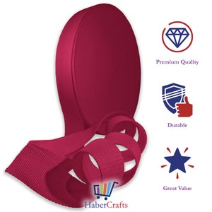 May include: A roll of crimson red webbing, a type of heavy-duty fabric tape, is shown in a close-up image. The webbing is folded and coiled, showcasing its texture and flexibility. The image also includes text that reads "Premium Quality", "Durable", and "Great Value".