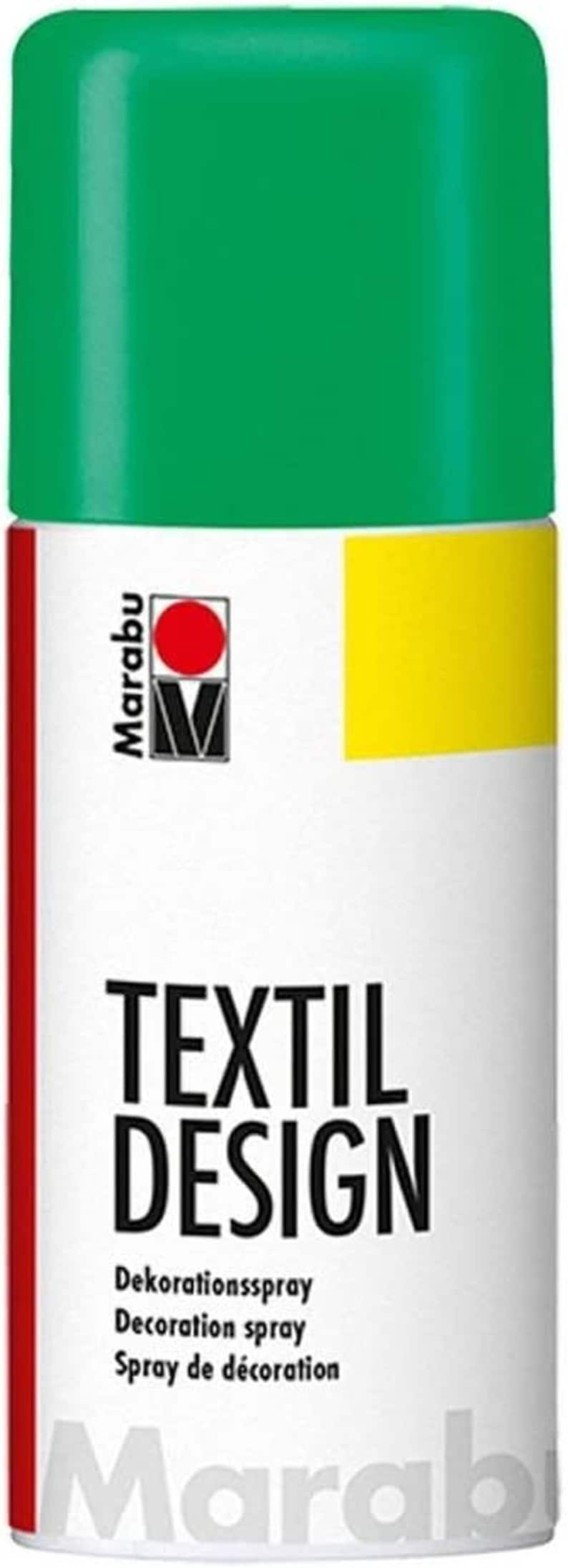 May include: A green spray paint can with the text "TEXTIL DESIGN" and the words "Dekorationsspray, Decoration spray, Spray de d&eacute;coration" in black text. The can has a red and white Marabu logo.
