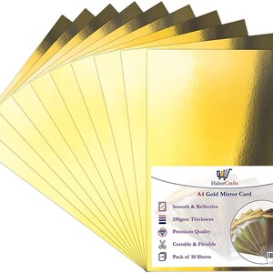 K&ouml;nnte beinhalten: Eine Packung mit 10 Blatt A4 Gold-Spiegelkarton. Der Karton ist glatt und reflektierend, mit einer Dicke von 250 g/m&sup2;. Er ist von Premiumqualit&auml;t, schneidbar und flexibel.