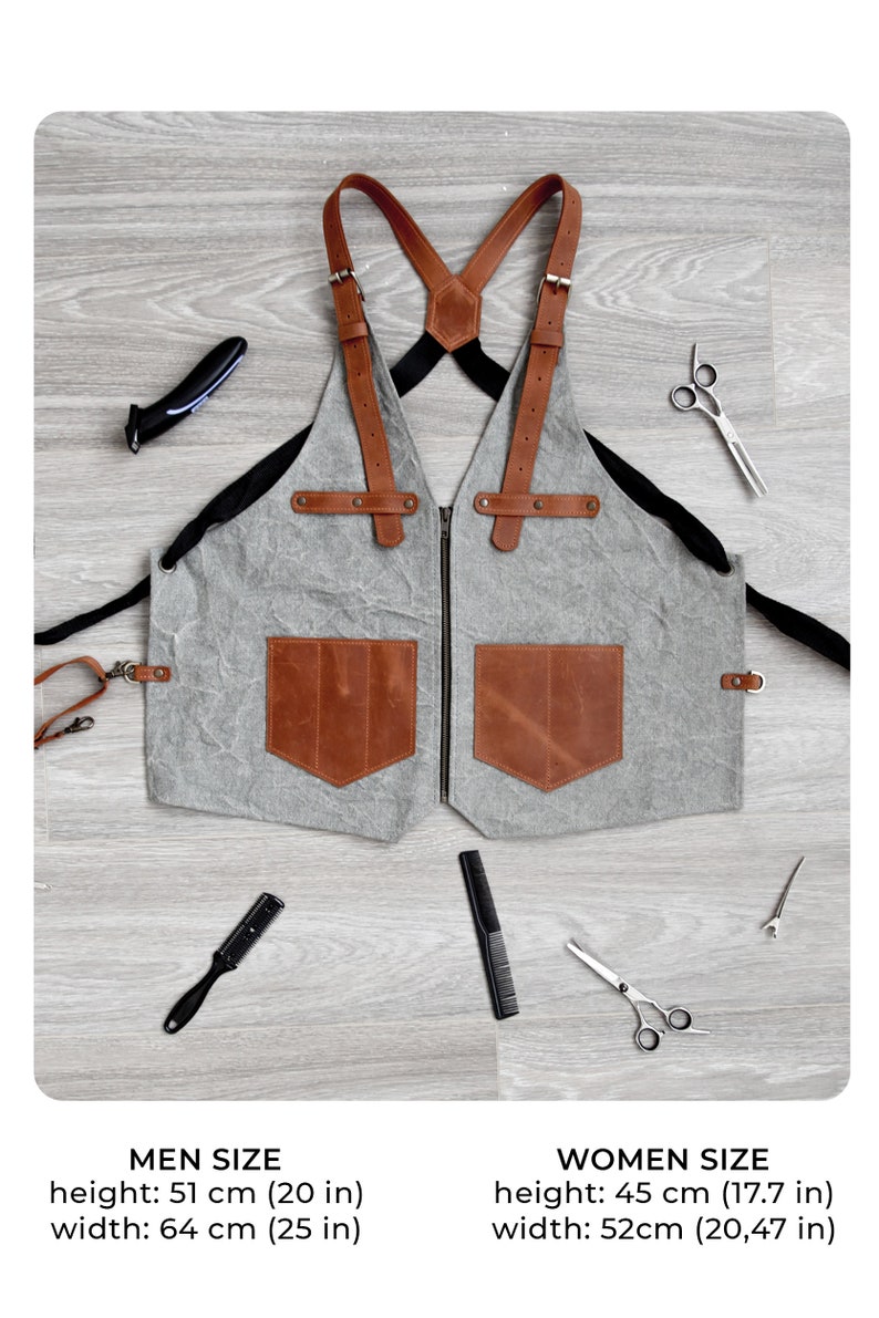 May include: A gray canvas and brown leather apron with adjustable straps and two large pockets. The apron measures 51 inches in height and 25 inches in width.