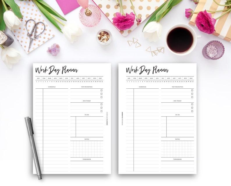 May include: Two white Work Day Planner sheets with black text, featuring sections for schedule, top priorities, to-do, and notes. A silver pen rests on the left. The image includes flowers, coffee, and decorative items.