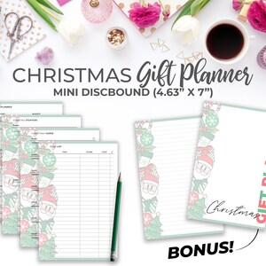 May include: A Christmas gift planner with a festive design featuring Santa Claus and a Christmas tree. The planner is a mini discbound size, measuring 11.76 cm by 17.78 cm. The planner includes pages for gift ideas, wish lists, and stocking stuffers.