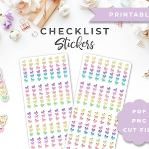 May include: Printable checklist stickers featuring a rainbow bow design. The stickers are available in PDF, PNG, and cut file formats.