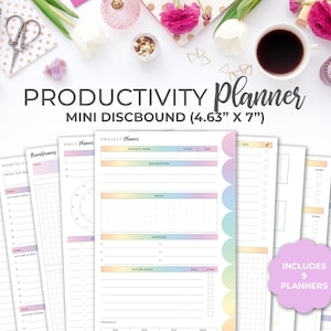 May include: A set of nine productivity planners in a rainbow colour scheme. The planners are designed for daily, monthly, brainstorming, and project planning. The planners are 4.63 inches by 7 inches and are designed to be used with a discbound system.