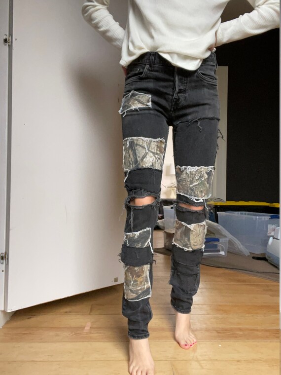 Ripped jeans with camo patches 2025