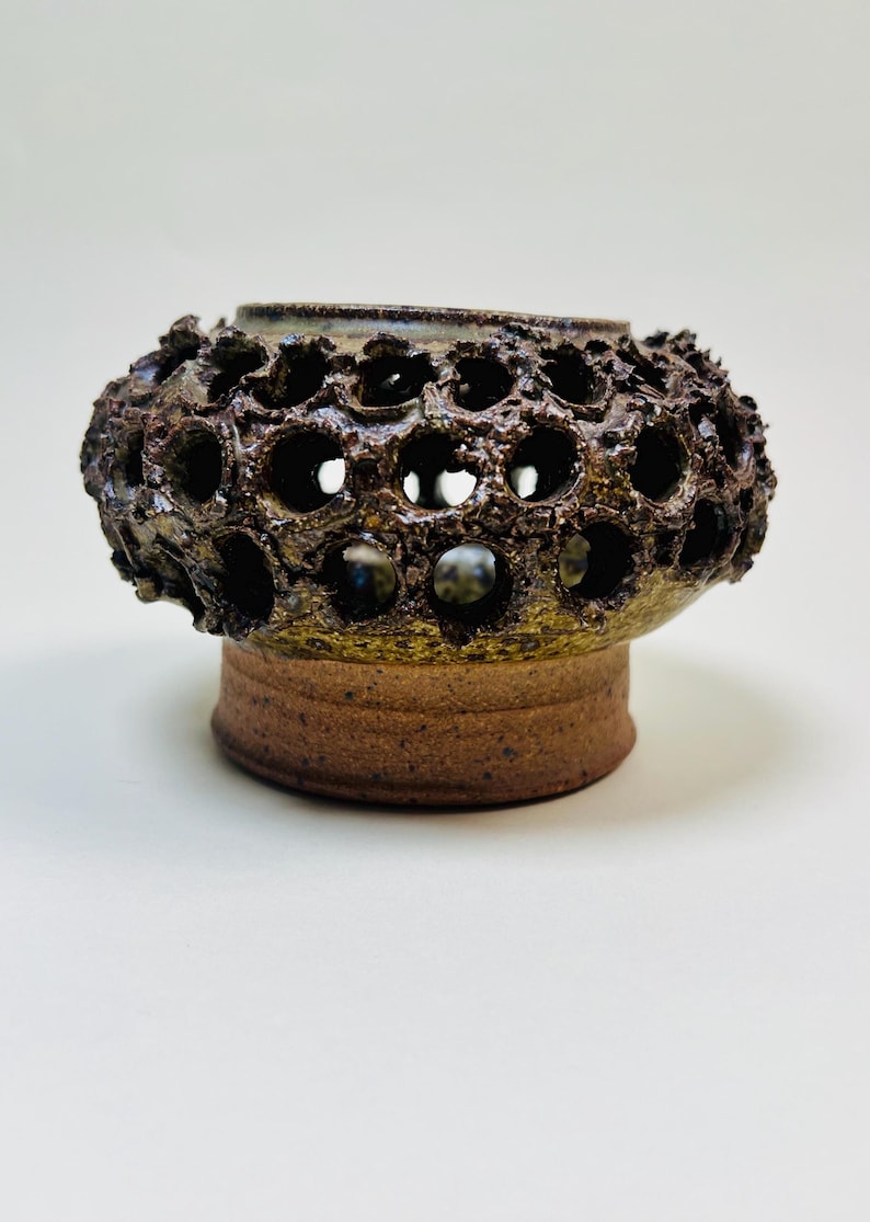 Vintage Brutalist style candle holder by Frank Milo Tromborg from the 1970s, featuring a textured, rustic design with circular cutouts, perfect for wabi sabi and vintage décor enthusiasts.