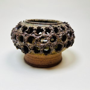 Vintage Brutalist style candle holder by Frank Milo Tromborg from the 1970s, featuring a textured, rustic design with circular cutouts, perfect for wabi sabi and vintage décor enthusiasts.
