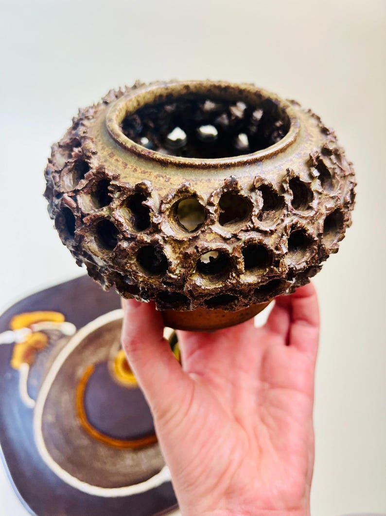 Vintage Brutalist style candle holder by Frank Milo Tromborg from the 1970s, featuring a textured, rustic design with circular cutouts, perfect for wabi sabi and vintage décor enthusiasts.
