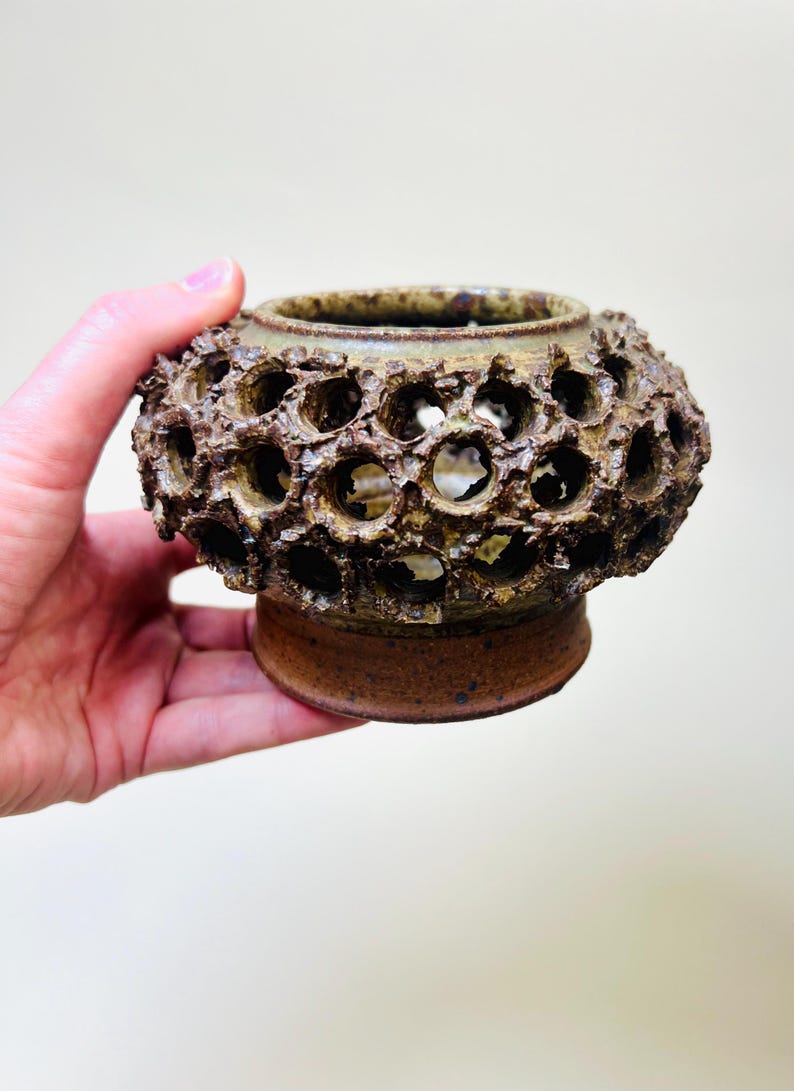Vintage Brutalist style candle holder by Frank Milo Tromborg from the 1970s, featuring a textured, rustic design with circular cutouts, perfect for wabi sabi and vintage décor enthusiasts.