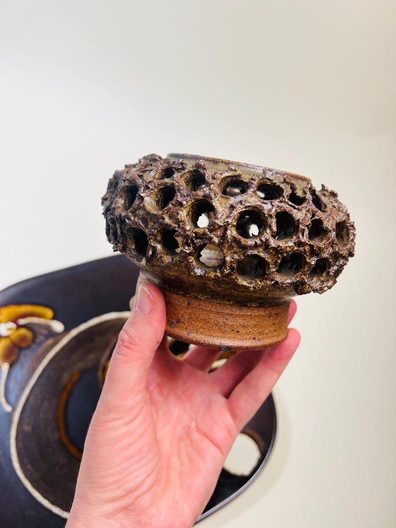 Vintage Brutalist style candle holder by Frank Milo Tromborg from the 1970s, featuring a textured, rustic design with circular cutouts, perfect for wabi sabi and vintage décor enthusiasts.