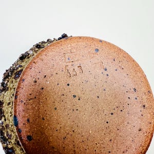Vintage Brutalist style candle holder by Frank Milo Tromborg from the 1970s, featuring a textured, rustic design with circular cutouts, perfect for wabi sabi and vintage décor enthusiasts.