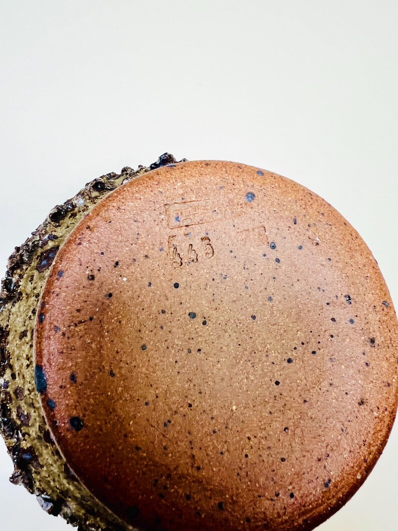 Vintage Brutalist style candle holder by Frank Milo Tromborg from the 1970s, featuring a textured, rustic design with circular cutouts, perfect for wabi sabi and vintage décor enthusiasts.