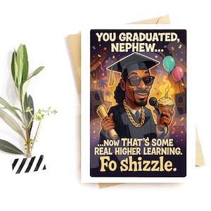 May include: Graduation greeting card featuring an illustration of a cartoon character wearing a graduation cap and sunglasses, holding a microphone and a cupcake. The card reads "YOU GRADUATED, NEPHEW...NOW THAT'S SOME REAL HIGHER LEARNING. Fo shizzle."