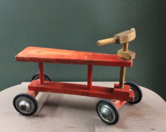 Red children's balance bike from the 1950s