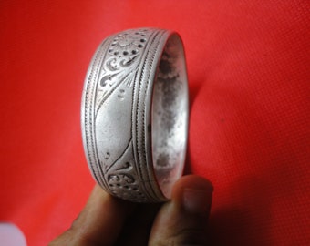 Moroccan Jewelry, antique fine silver Berber  bangle, very worn, flower design, 2 1/2 inches inner diameter