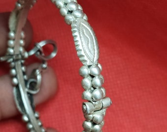 Moroccan Jewelry, old silver Saharan/Tuareg granulated clasp bracelet with applied ovals, 2 1/4 inches diameter