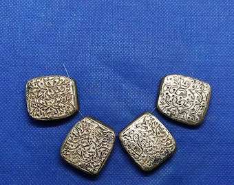 Moroccan jewelry, lot 4 old Saharan brass silver Hjab/talisman arabesque design pendants. 1 1/8 inches long