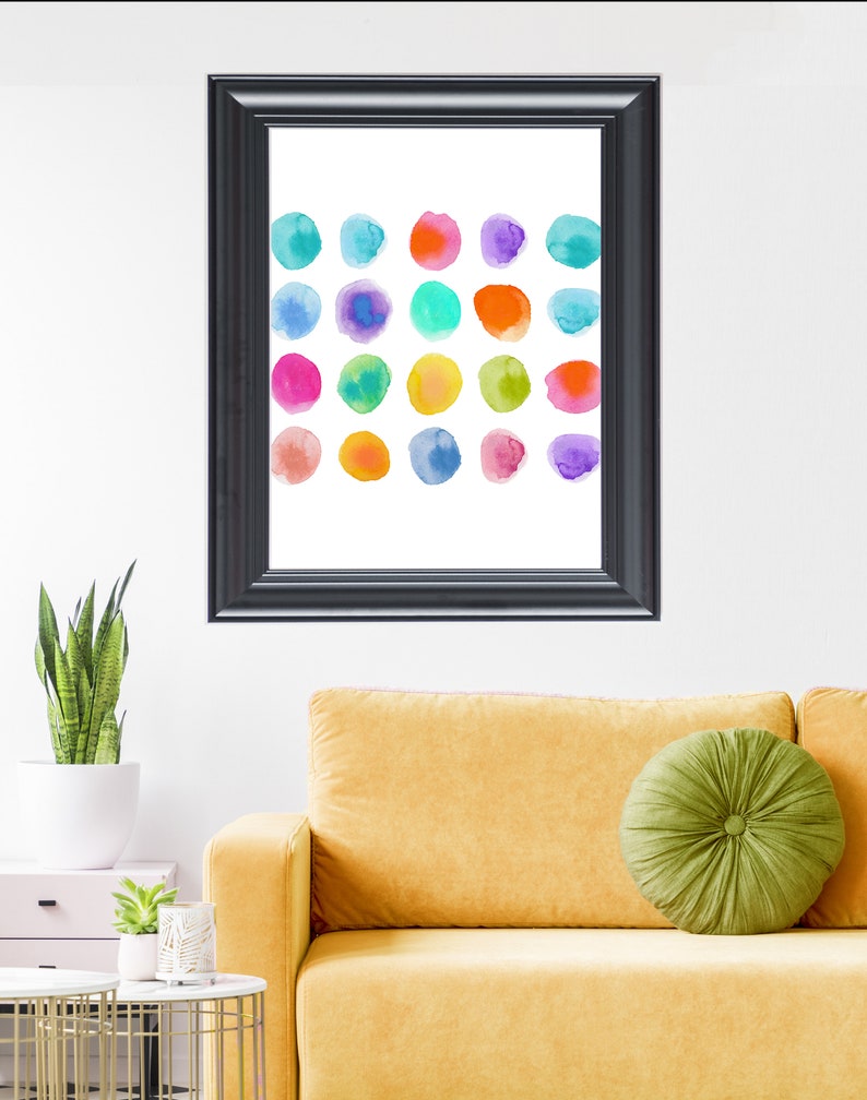 K&ouml;nnte beinhalten: Ein gerahmter Druck mit wei&szlig;em Hintergrund und einem Raster aus 20 bunten Aquarellkreisen. Die Kreise sind in verschiedenen Blaut&ouml;nen, Gr&uuml;nt&ouml;nen, Gelbt&ouml;nen, Oranget&ouml;nen, Rosat&ouml;nen und Violettt&ouml;nen gehalten.