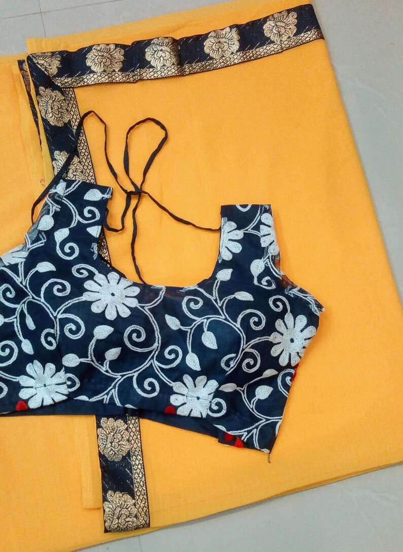 yellow saree with navy blue blouse