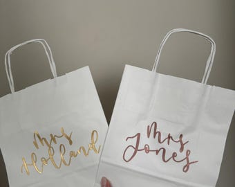 Handwritten personalised customised hen birthday party bag in brown kraft or white paper with silver, rose gold, white or black calligraphy