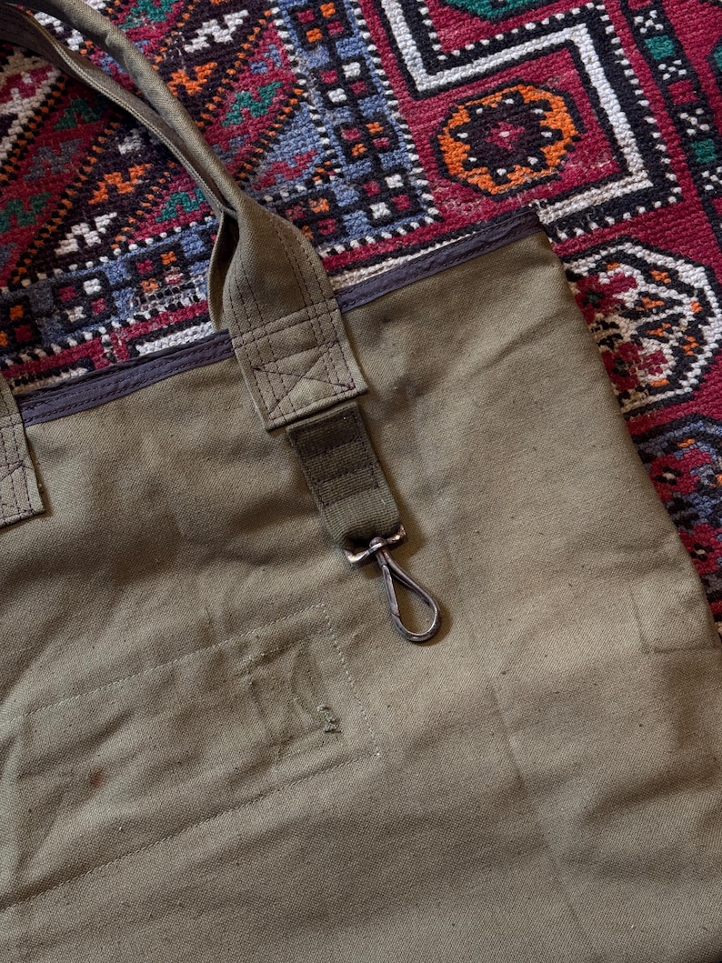 May include: A set of three ceramic mugs with a speckled, matte finish in cream, light brown, and dark brown. Each mug has a minimalist design and a rounded handle.