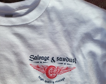 Bergungs- und Sägemehl-Limited Edition Flying Wheel T-Shirt, 100% Baumwolle.