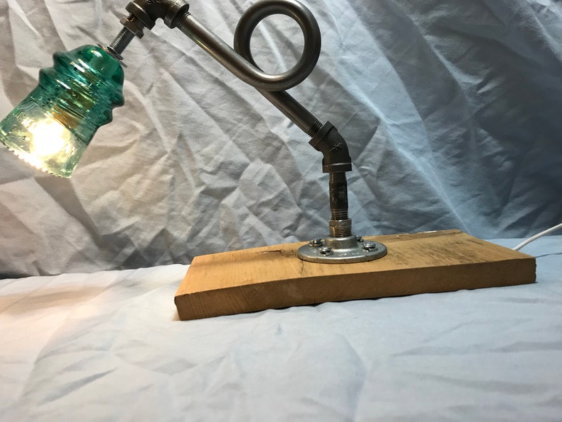 Beautiful vintage Hemingray insulator steampunk pipe desk lamp.