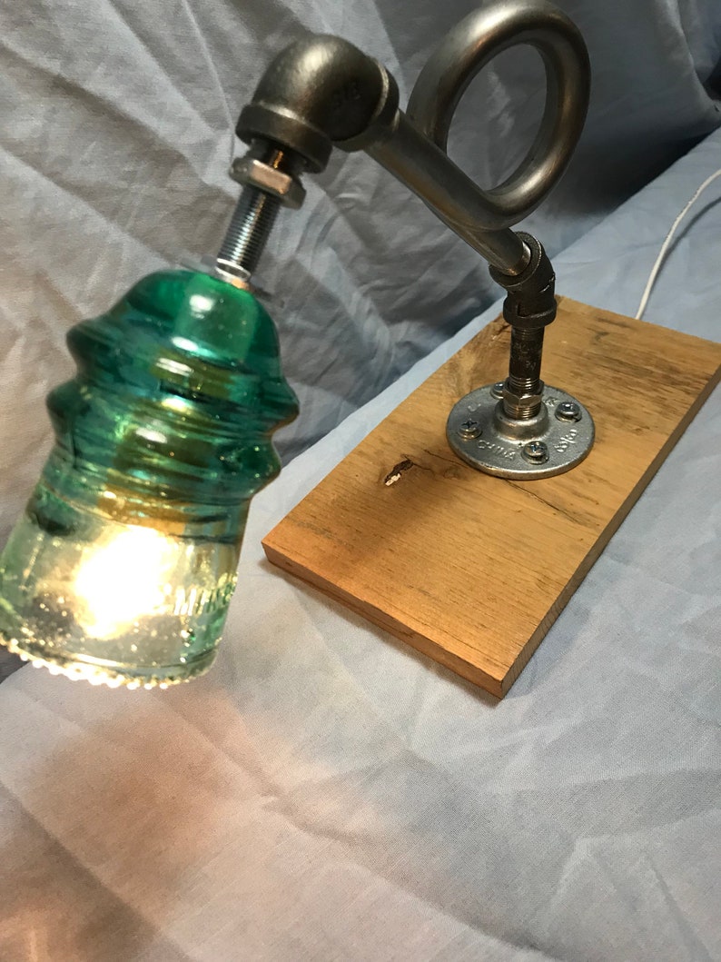 Beautiful vintage Hemingray insulator steampunk pipe desk lamp.
