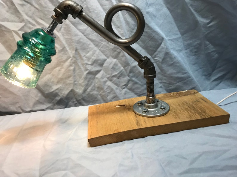 Beautiful vintage Hemingray insulator steampunk pipe desk lamp.