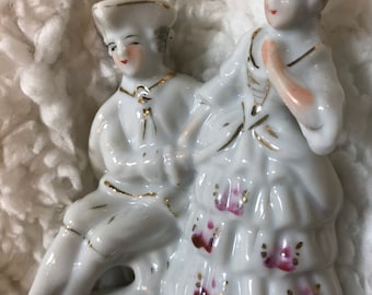 Vintage Colonial couple, porcelain figurine.