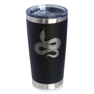 May include: Black insulated tumbler with a silver snake design. The tumbler has a stainless steel rim and a clear plastic lid. The snake is intricately detailed, adding a unique touch to this drinkware.