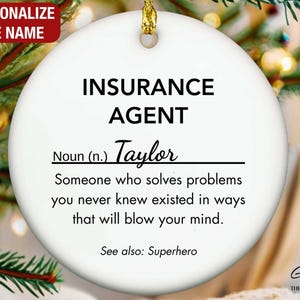 May include: A white ceramic Christmas ornament with gold hanging string. The ornament has the text "INSURANCE AGENT" and a definition. The name "Taylor" is written on the ornament. The text "PERSONALIZE THE NAME" is at the top left.