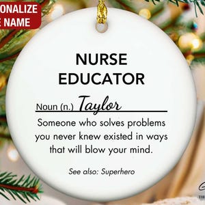 May include: A white ceramic Christmas ornament with gold trim and a gold string for hanging. The ornament reads "NURSE EDUCATOR" with a personalized name and a definition. The text "PERSONALIZE THE NAME" is at the top.