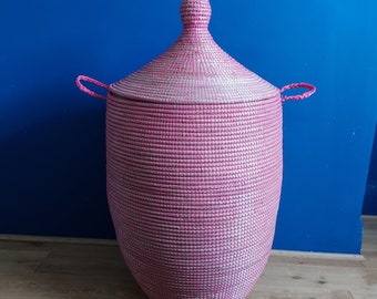 Pink,handwoven laundry / storage basket.