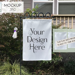 May include: A white garden flag with the text "Your Design Here" in black script. The flag is displayed on a black metal stand. Two additional flag sizes are included. Decorative ghost figures hang in the background.