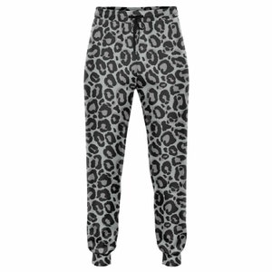 May include: Gray sweatpants with a black leopard print pattern.
