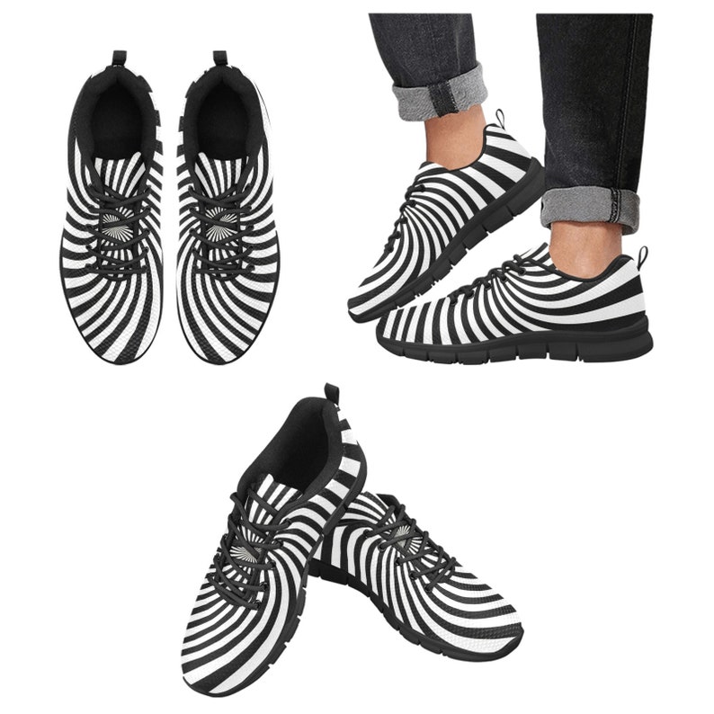 May include: A pair of black and white sneakers with a swirling, hypnotic pattern. The sneakers have a white sole and black laces.