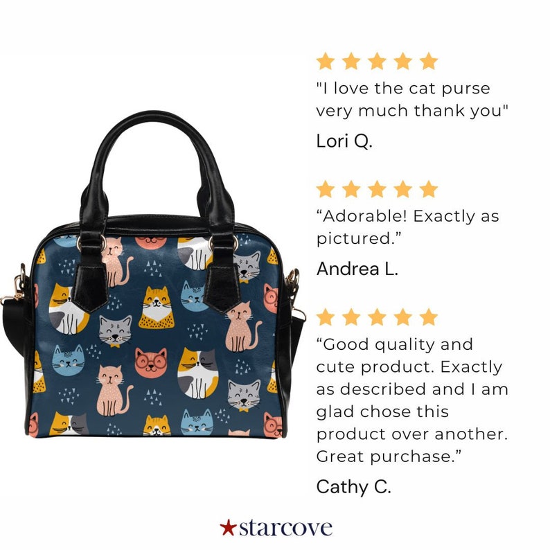 May include: A black handbag with a blue background and a pattern of colorful cartoon cats. The bag has a top handle and a shoulder strap.