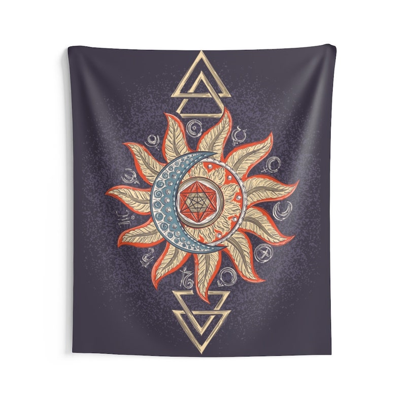 May include: A tapestry with a dark blue background featuring a stylized sun and moon design. The sun is yellow and orange with a red center and the moon is blue with a red geometric shape in the center. The design is surrounded by a circle of smaller symbols.
