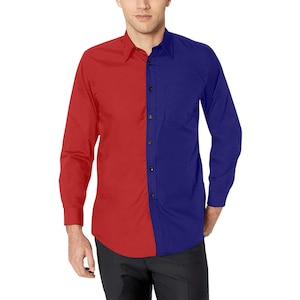 May include: A long-sleeved button-down shirt with a red and blue color block design. The shirt has a classic fit and a pointed collar.