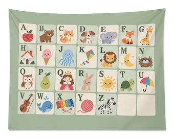 May include: A sage green wall tapestry featuring a grid of alphabet letters from A to Z. Each letter is paired with a corresponding illustration, such as an apple for A, a bear for B, a cat for C, and a zebra for Z, printed in a soft color palette.