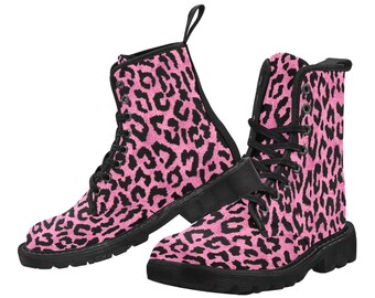 May include: Pink and black leopard print lace-up boots with a black sole.