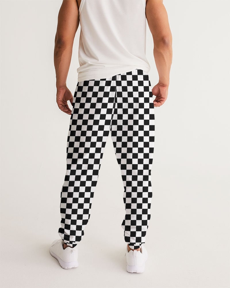 Man in gray and black checkered sport shirt and black pants outfit photo –  Free Apparel Image on Unsplash
