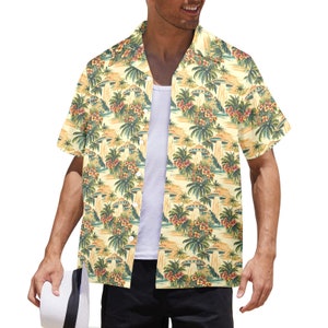 May include: A yellow short-sleeved button-down shirt with a tropical print featuring palm trees, flowers, and flying saucers.
