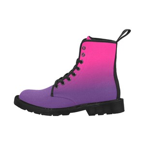 May include: Pink and purple ombre canvas boots with black laces and a black sole.