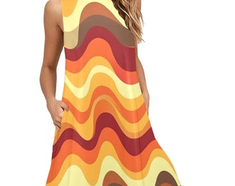May include: A sleeveless, yellow, orange, red, and brown dress with a wavy pattern.