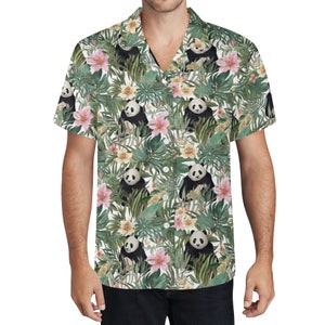 May include: A white short-sleeved button-up shirt with a tropical print featuring pandas, flowers, and leaves.