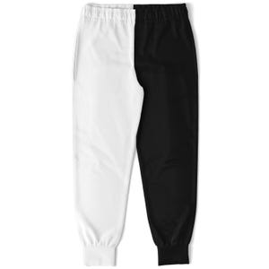 Pode incluir: Um par de calças de treino bicolores, divididas verticalmente em duas metades. Um lado é branco e o outro preto. As calças têm cós elástico e punhos nos tornozelos. O material parece ser leve.