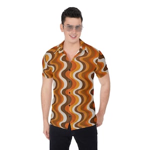 May include: Short-sleeved button-down shirt with a retro wavy pattern in shades of brown, orange, and cream. The shirt has a classic collar and a relaxed fit, perfect for a casual, vintage-inspired look.